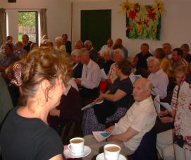 Parishioners gathered for questions and answers (and tea) at a parish meeting