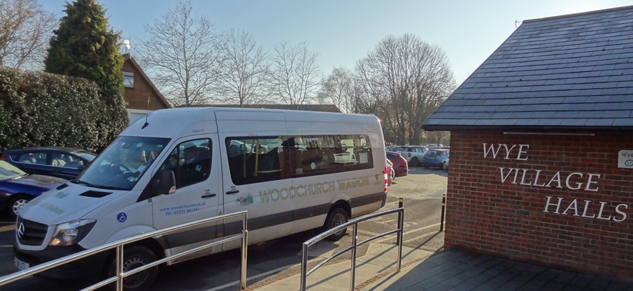 The 'Woodchurch Wagon' is a 16 seat minibus seen here leaving Wye Village Hall with Community Lunch members on board, on their way home to Brook and Hastingleigh.