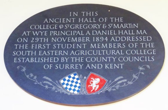 A slate plaque in the Old Hall, Wye College, built 1447 to commemorate the inauguration of the South East Agricultural College in 1894, the forerunner of Wye College