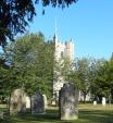 Image: Wye parish church and its peaceful setting, mown by Wye Parish Council as a public green space